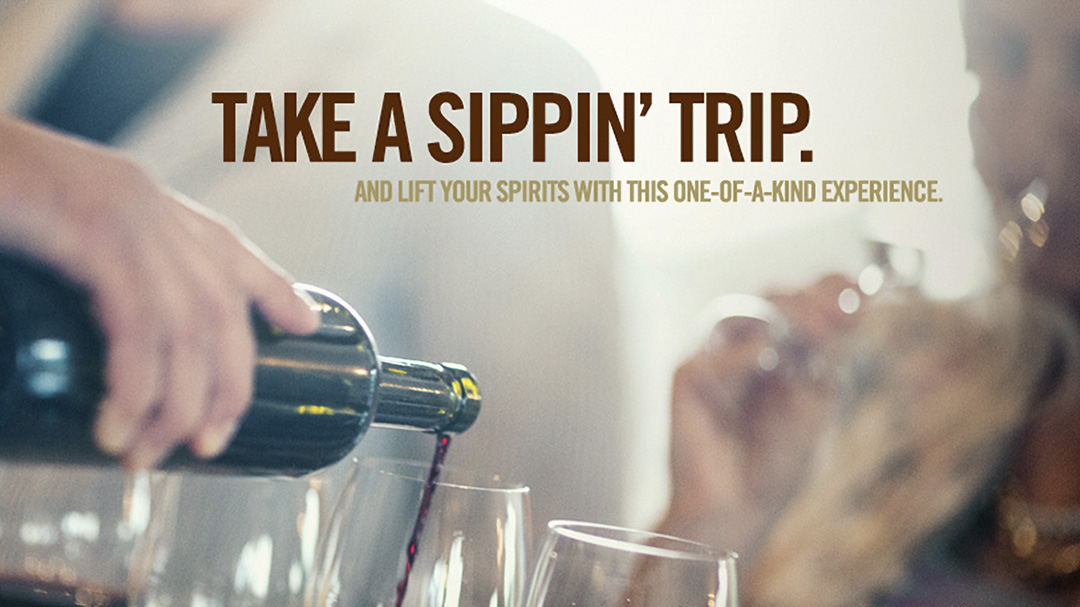 Soft focus image of a hand pouring wine while a person drinks from a glass with text over the image reading "Take a Sippin' Trip. And lift your spirits with this one-of-a-kind experience."