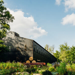 Hard Truth Distillery in the Spring with blooming flowers.